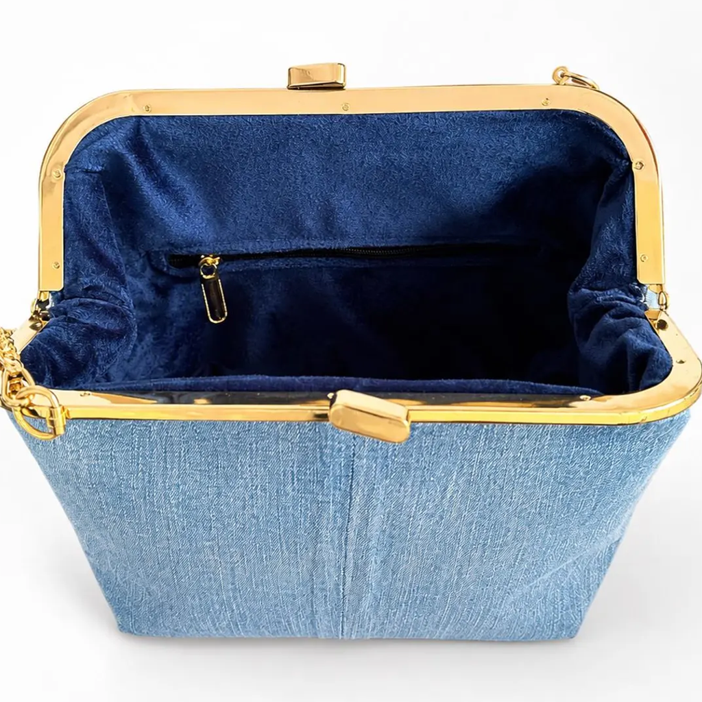 Light Wash Blue Woven Denim Rectangular Frame Clutch With Polished Gold Rim Press Clasp, Detachable Linked Metal Chain And Velvet Lined Inner Zip Divider Slot