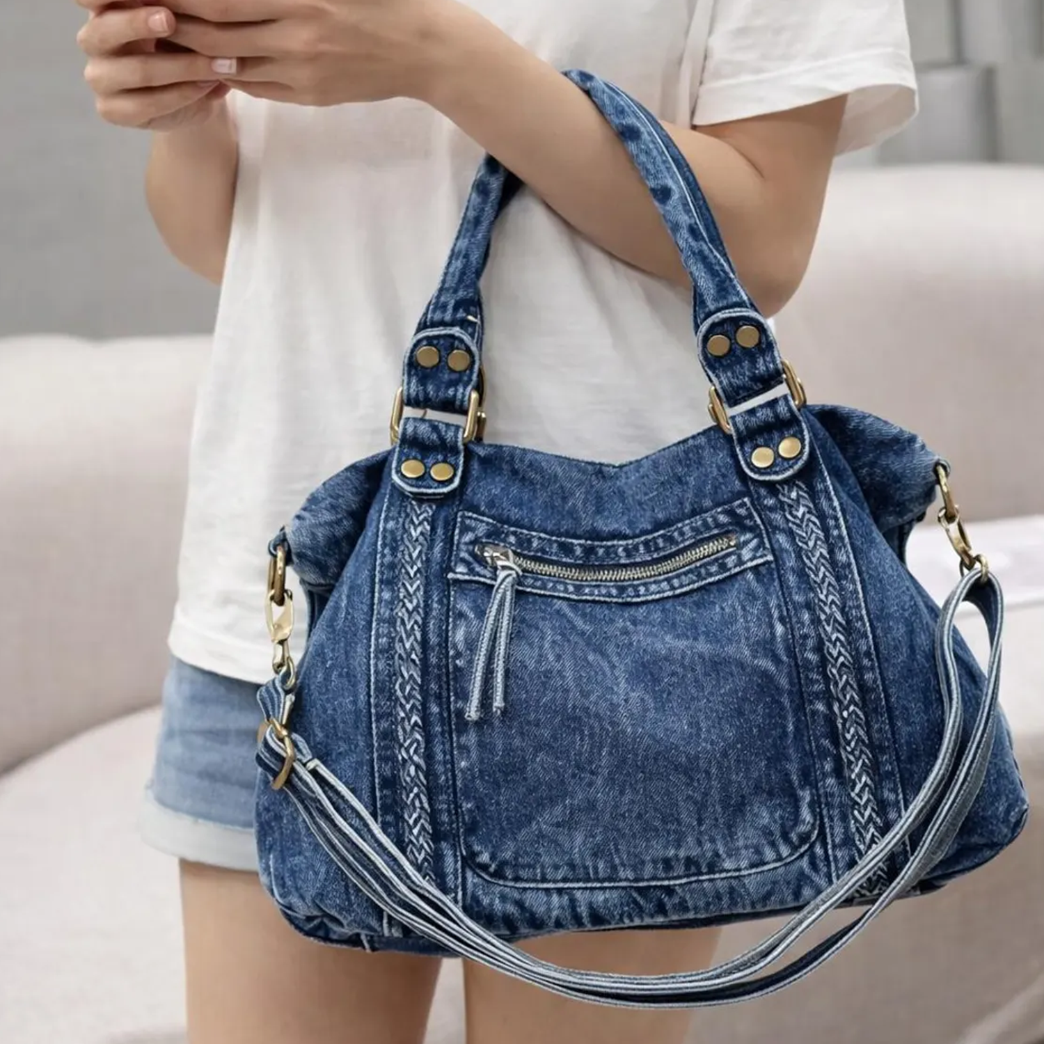 Faded Vintage Washed Blue Denim Slouchy Shoulder Tote With Vertical Braided Front Trim, Stud Reinforced Top Handles And Detachable Multi-Strand Denim Carry Strip Hardware