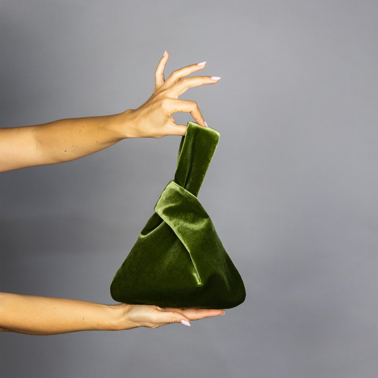 Soft Velvet Origami Triangle Handheld Pouch With Integrated Twisted Knot Wrist Loop And Smooth Satin Lined Compact Storage Cavity