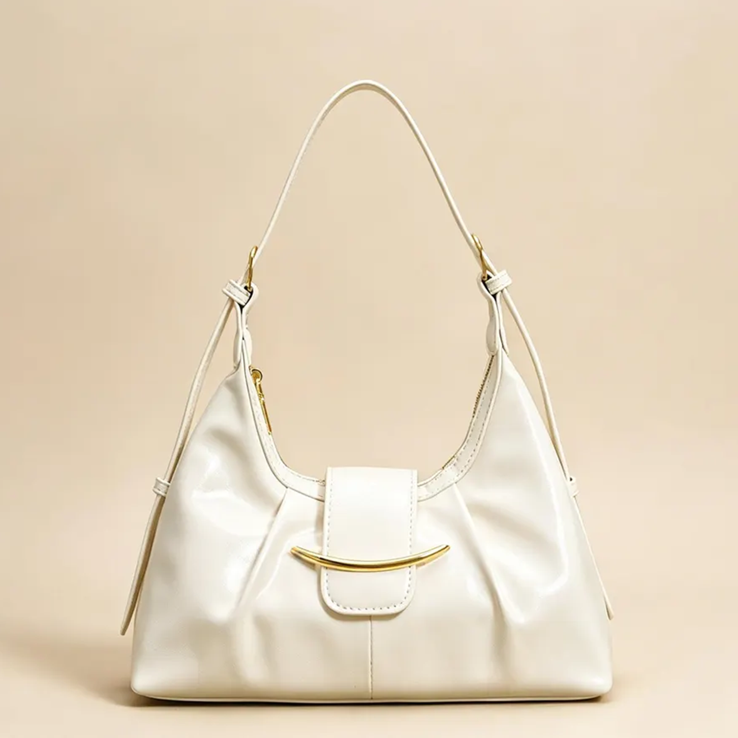 High-Gloss Gathered Pleat Crescent Underarm Bag With Curved Gold Bar Flap Accent, Slider Fitted Shoulder Strap And Secure Curved Top Zip Closure Hardware Leather Bag
